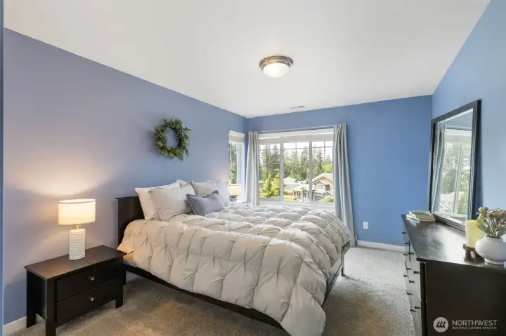 Bedroom 1 of 4. Features a terrific closet organizing system and lots of space.