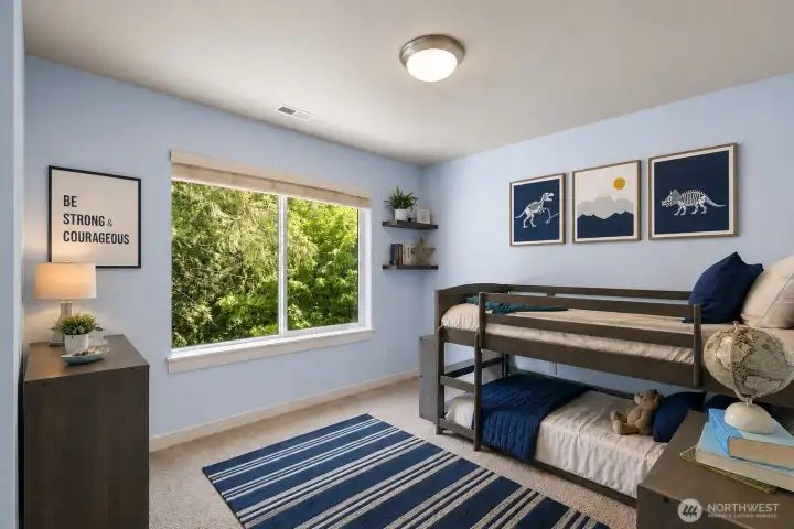 Bedroom 4 of 4 on second floor. Great view of backyard and custom closet system.  *Some decor is digitally staged.