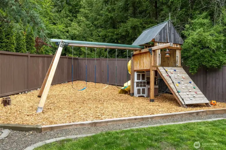 Custom playstructure built with love with many pieces salvaged from historic location throughout the state. Conveys with home.