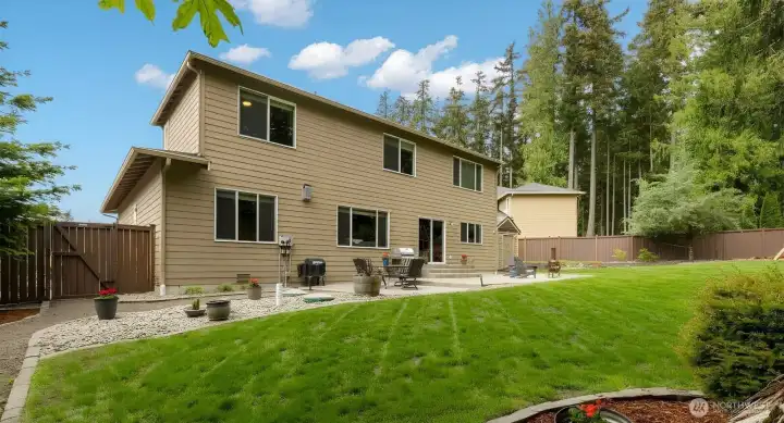 Beautiful backyard is fully fenced.