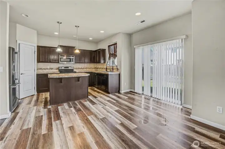 Open layout of most used places in the house with LVP flooring.