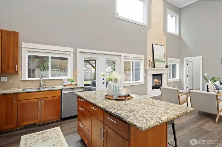 Gorgeous 2-story ceiling, expansive windows and French doors. Gas fireplace completes this gorgeous space.