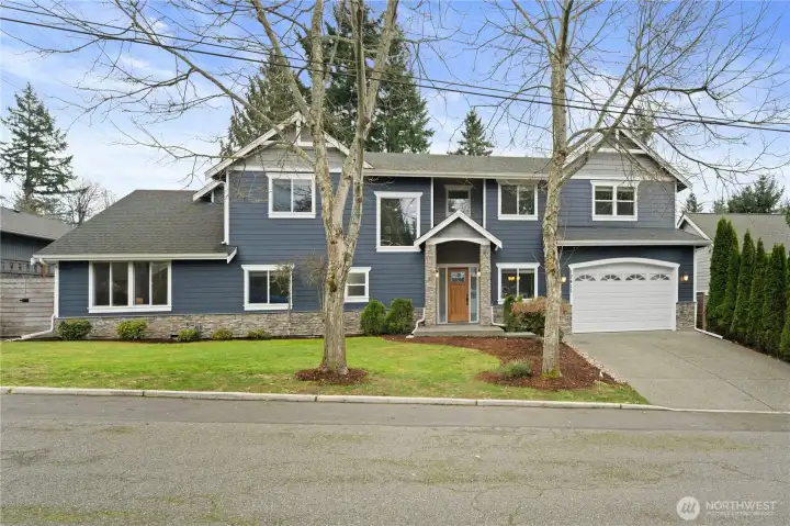 Ideal Rose Hill location 5 BR, 3.25 BA, Main Floor Primary on a large level backyard.