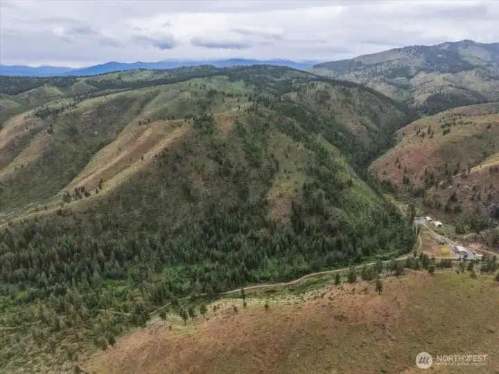 Aerial view of property and topography. Aerial view of property and topography.