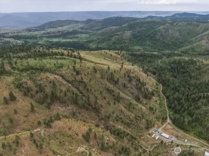 Aerial view 11 of property and topography. Aerial view 11 of property and topography.