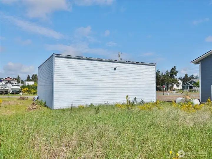 Rear view of the commercial/residential building. Rear view of the commercial/residential building.