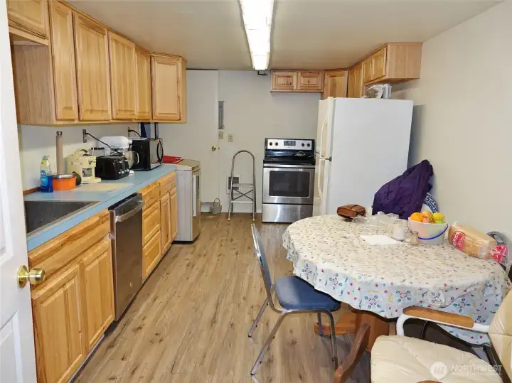Downstairs Kitchen w/ laminate flooring. Downstairs Kitchen w/ laminate flooring.