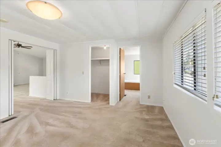 Large primary bedroom with ensuite and walk in closet.