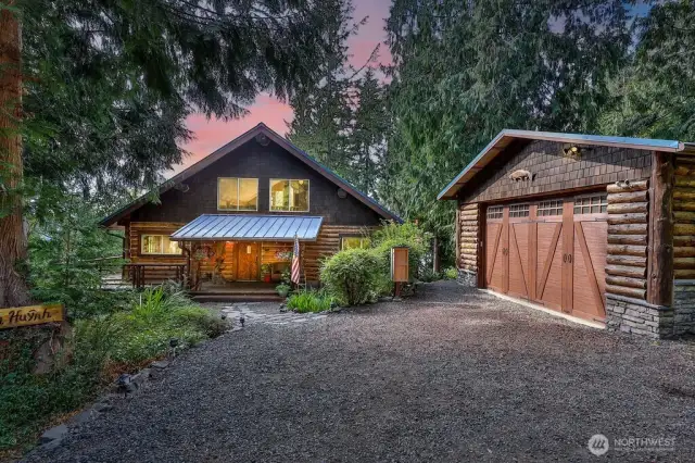 Welcome home!  (Electric car charging station boxed in wood)