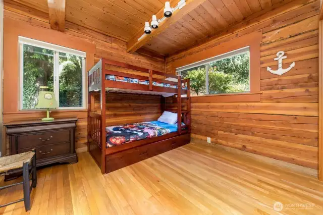 Bonus bedroom/office with closet looks out to entrance of home.