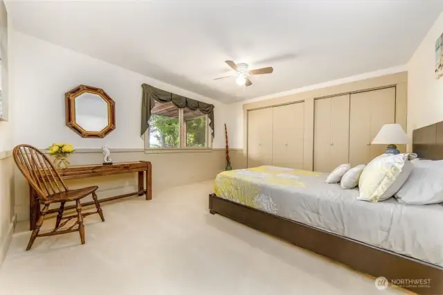 Ground level bedroom looks out to garden and firepit area.
