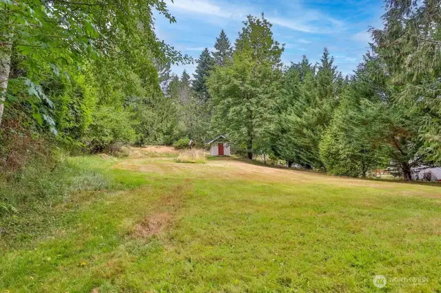 An extra field on north side of property great for games, exercise, or keeping livestock, horses.