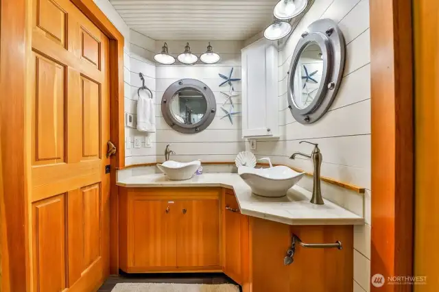 Custom bathroom on main floor with shower. There are 3 bathrooms total.