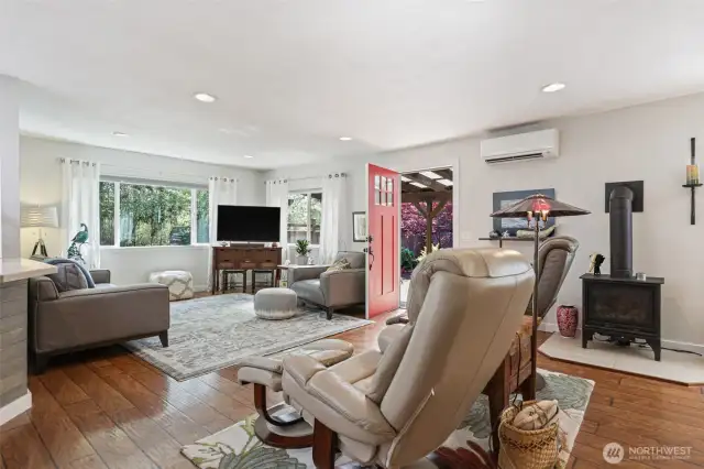 Living room with ductless heating/cooling and a propane stove