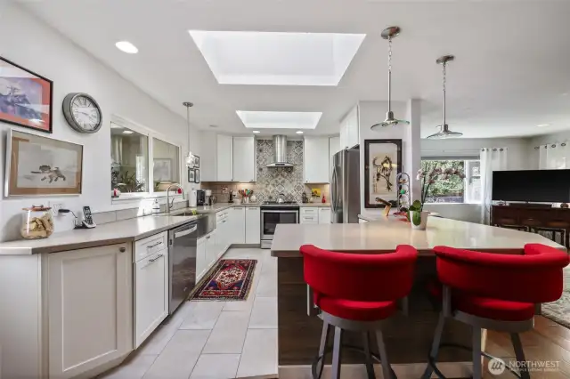 Chef's Kitchen with stainless appliances and corian counters.