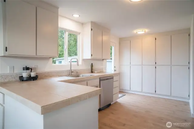 solid wood cabinets with full wall cabinet storage