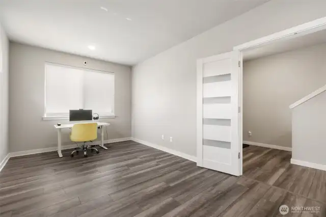This flexible room behind elegant French doors is perfect as a home office, guest retreat, playroom, or cozy reading nook. The possibilities are wide open.