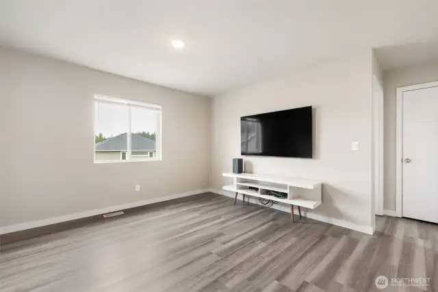 This versatile upstairs loft is ready to become whatever you need — a cozy TV retreat, reading nook, play space, or home gym. Just bring your vision!