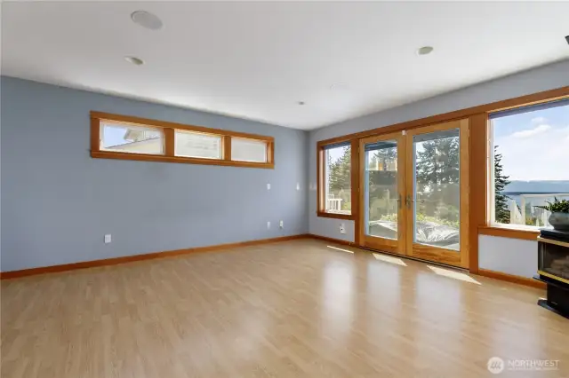 You can never get enough light.  These upper windows allow room for your bed below