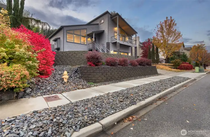 Fully fenced, irrigated terraced yard maximizing privacy and stunning scenery from all angles.