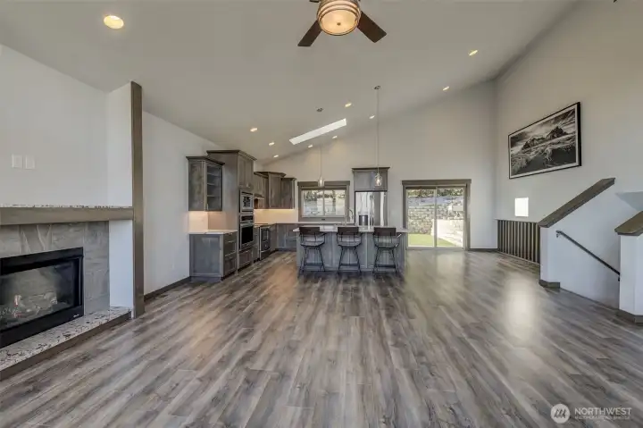 Large Open Main Level with vaulted ceilings & LVP.