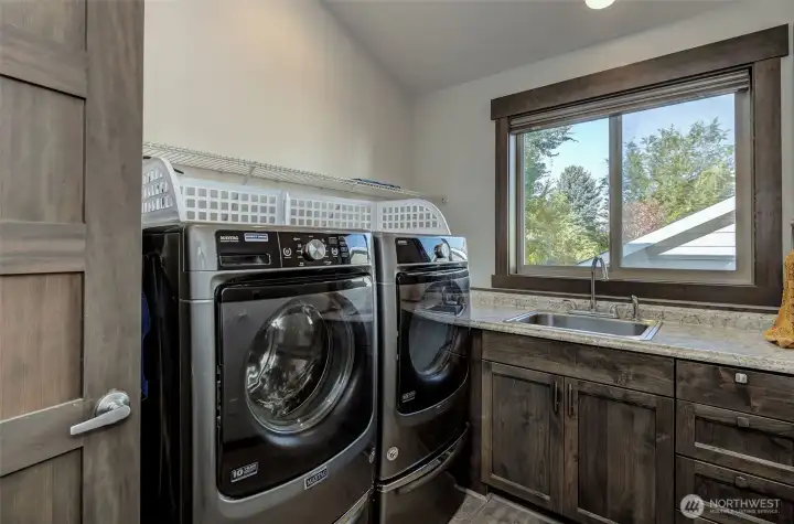 Laundry located upstairs with 3 bedrooms & 2 full bathrooms