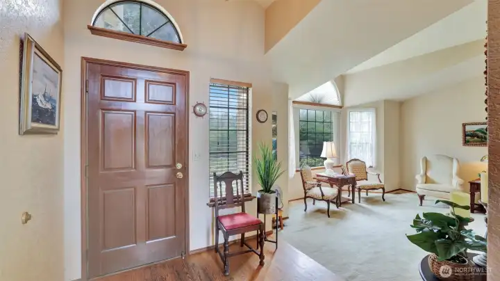 Bright, open floor plan with vaulted ceilings.