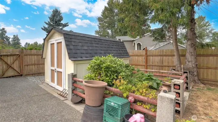 Large storage shed for lawn tools.