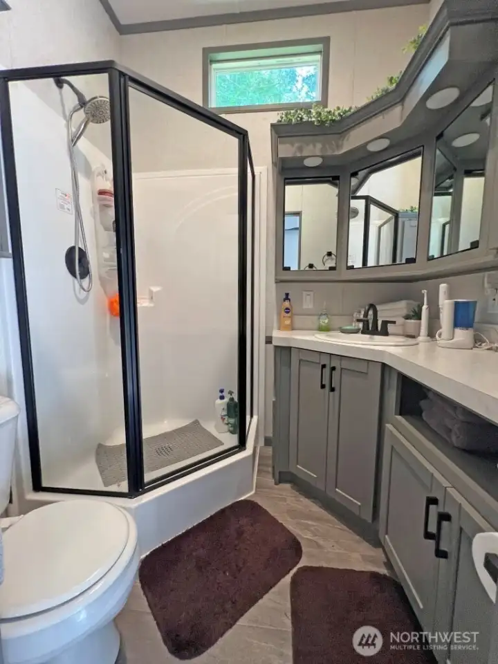 Bath with shower.
