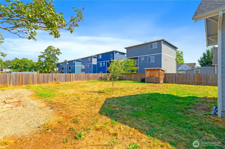Spacious partially fenced yard