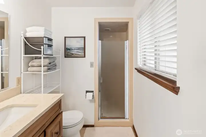 Primary suite's 3/4 bath. digitally remved towels