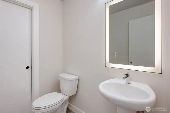 Backlit Mirror On Main Level Bathroom