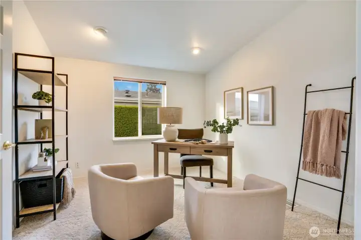 Large den opens to the living and dining room. Canned lighting throughout the home.