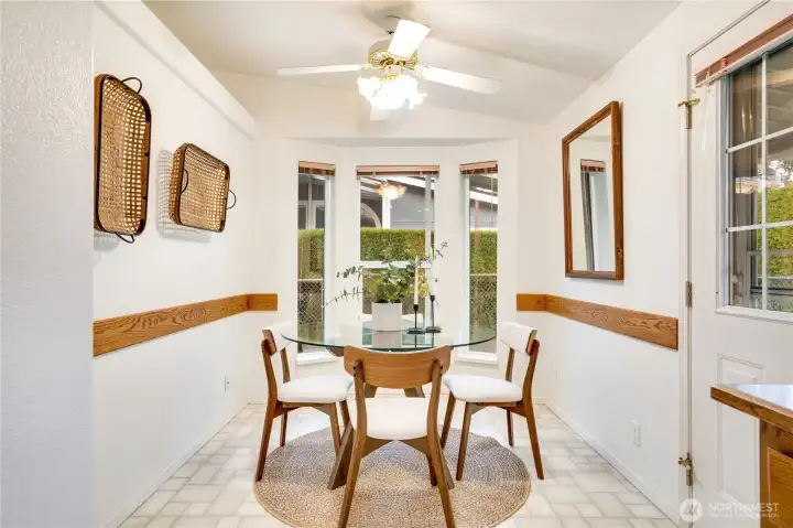 Attached dining nook. Drink your coffee and watch the birds play