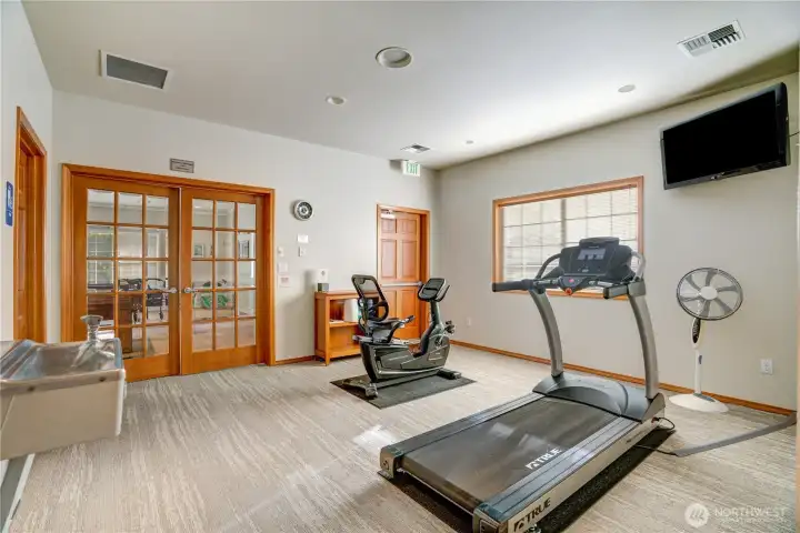 Small workout room with television