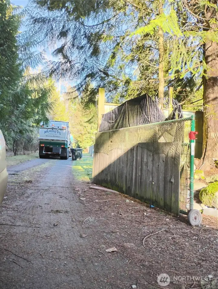 There is garbage service that comes down the road to the property and the mailbox station is a few lots away.
