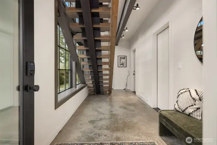 Dedicated private entry with with access to your 2-car garage, private elevator, and flexible commercial space (available separately)