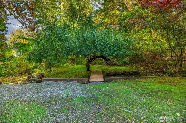 bridge over creek to more yard