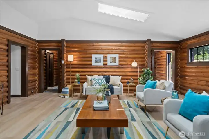 From the spacious living room, bedrooms and bathroom live to the left and the kitchen with dining space is to the right.