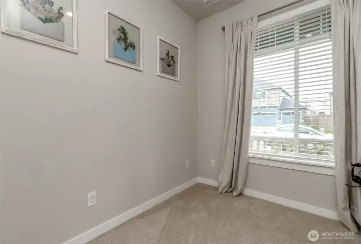 Main floor bedroom or office with a closet