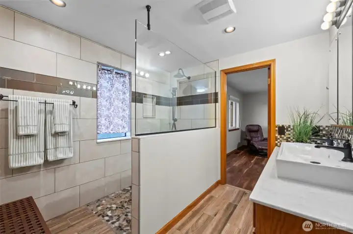 Updated spa-like bathroom with walk-in shower.