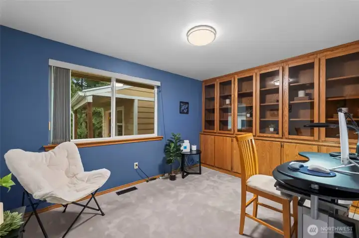 Bedroom 3 on the main level.  Great for an office as well!