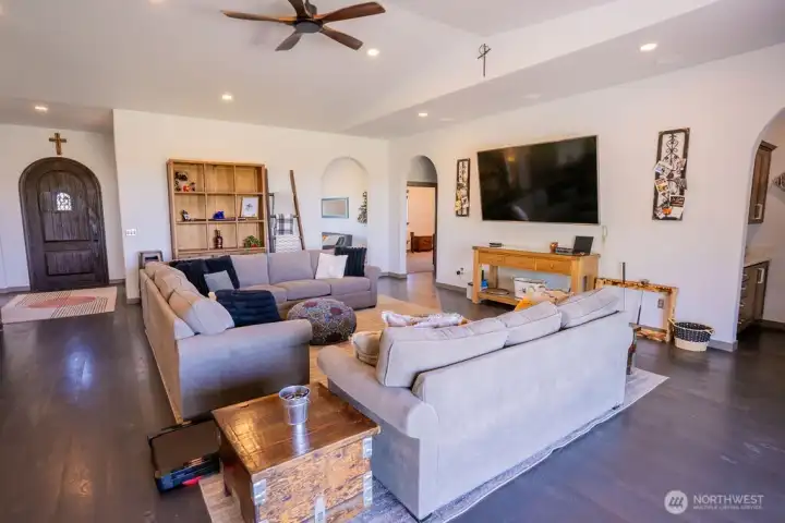 Large living room, that's an 80" TV on the wall!
