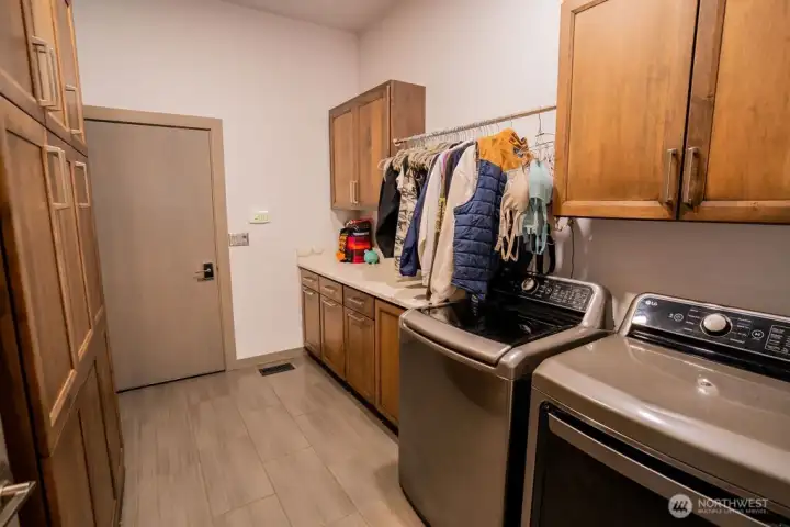 Large Laundry room, leading to attached 2 car garage