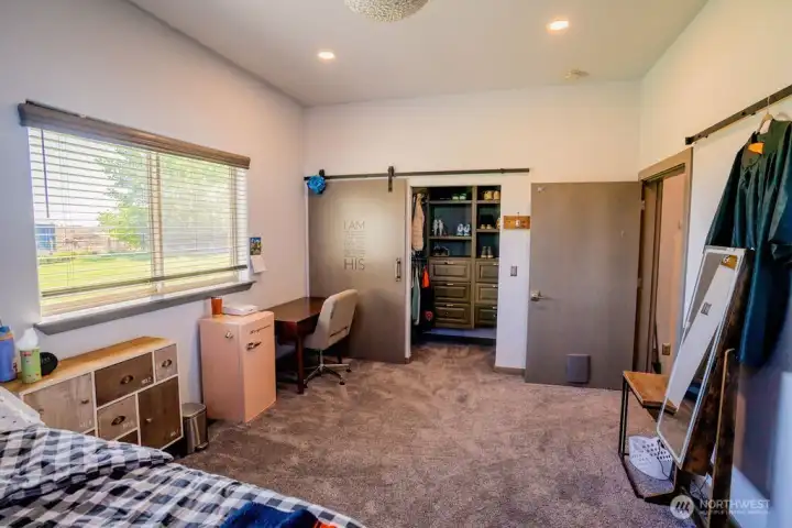 2nd primary bedroom with large closet and built ins