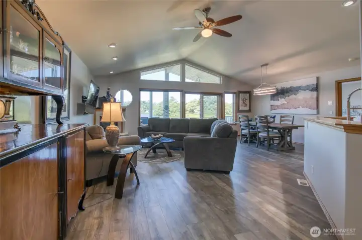 Enter into large great room with a wall of windows for amazing natural light