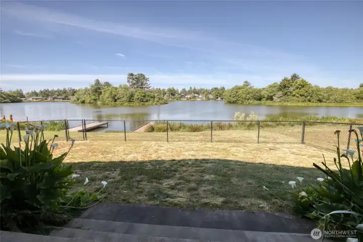 The new in 2025 chain-link fence creates a safe space but keeps the view of Duck Lake, the islands and wildlife