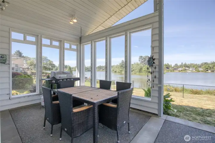 Covered glass walled in patio allows for all year use
