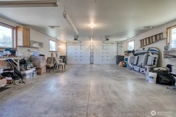 Large 4 car deep garage with workbench