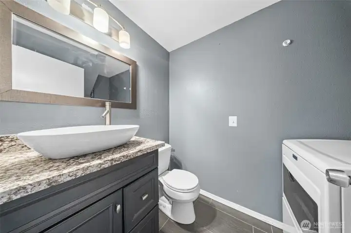 Lower 1/2 bath + laundry Lower 1/2 bath + laundry